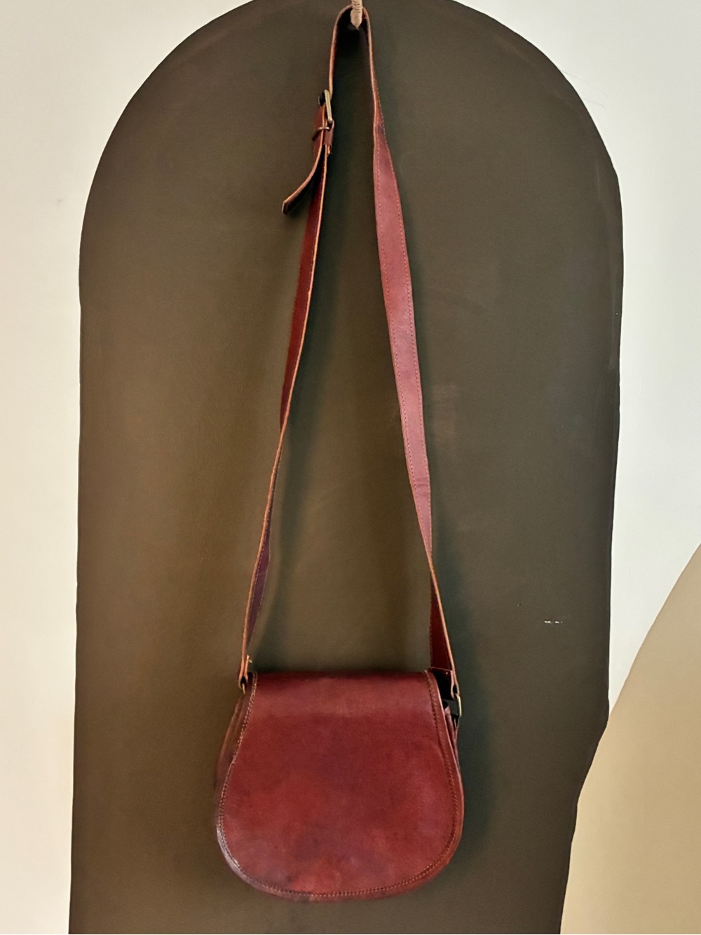 Vintage 1960s maroon Leather Saddle Crossbody Bag